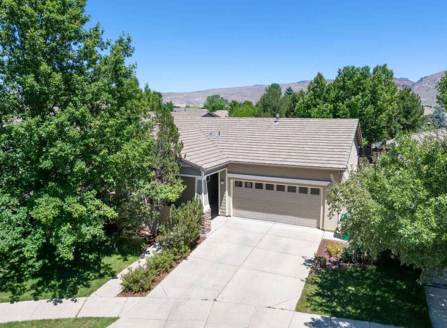 Discover this charming single-family home featuring a spacious two-car garage and a well-maintained driveway.