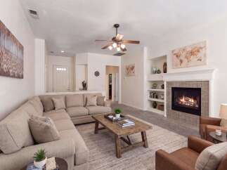 Step into this inviting living room, perfect for relaxation and entertaining.
