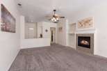 Step into this inviting living room, perfect for cozy evenings by the fireplace.
