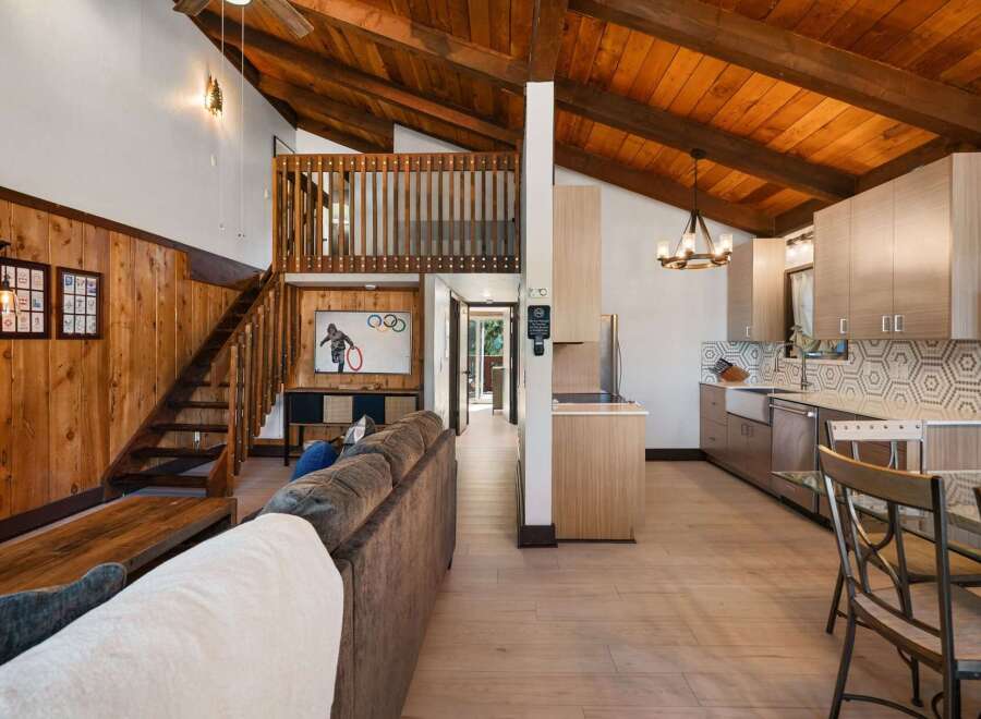 Experience rustic charm and modern convenience in this stunning mountain retreat.