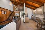 Experience rustic charm and modern convenience in this stunning mountain retreat.
