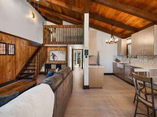 Experience rustic charm and modern convenience in this stunning mountain retreat.