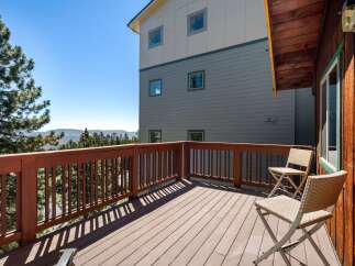 Enjoy breathtaking mountain views from this spacious deck, perfect for morning coffee or evening relaxation.