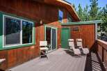 Enjoy the outdoors on this spacious wooden deck, perfect for relaxing or entertaining.