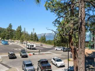 Discover this stunning property with breathtaking lake and mountain views, perfect for outdoor enthusiasts.