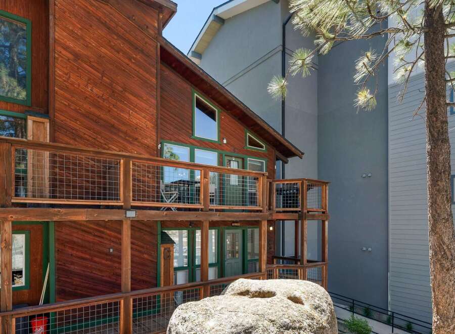 Experience mountain living in this charming wooden cabin, featuring multiple levels of private balconies perfect for enjoying the crisp air.