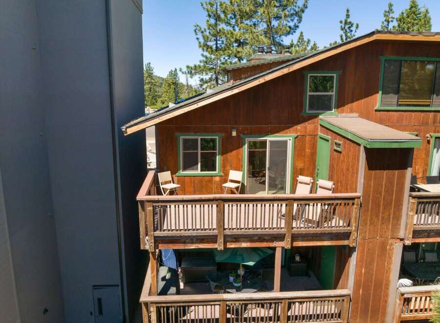 Experience outdoor living at its finest on the multi-level decks of this charming wooden home.