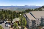 Experience breathtaking mountain views from this stunning property, featuring modern architecture and a prime location amidst lush pine forests.