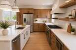 Experience luxury in this stunning modern kitchen, featuring sleek white quartz countertops and warm, natural wood cabinetry.