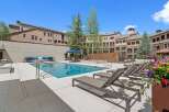 Enjoy resort-style living with this stunning outdoor oasis, featuring a sparkling swimming pool and a relaxing hot tub perfect for unwinding.