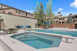 Enjoy a refreshing dip in this stunning outdoor pool and spa area, perfect for relaxation and entertainment.