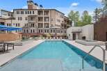 Experience luxury living with this stunning property featuring a sparkling swimming pool and relaxing hot tub, perfect for unwinding.