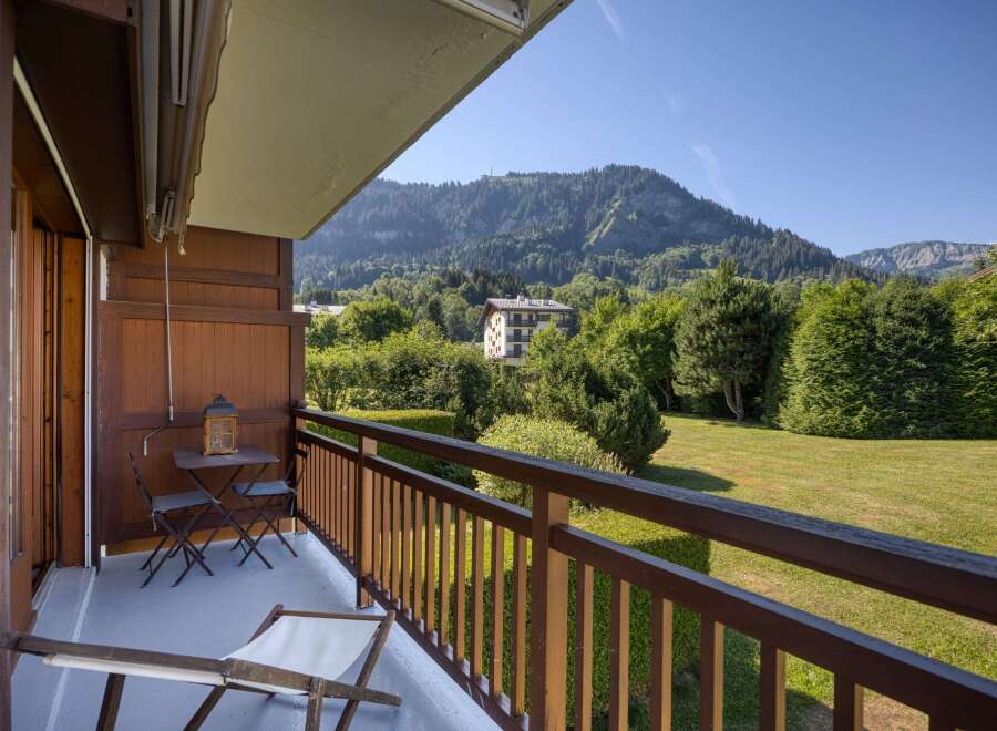 Enjoy breathtaking mountain views from this charming balcony, perfect for your morning coffee or evening relaxation.