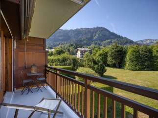 Enjoy breathtaking mountain views from this charming balcony, perfect for your morning coffee or evening relaxation.