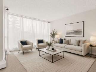 Step into this inviting living room, bathed in natural light from expansive sheer curtains.