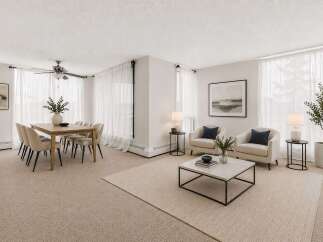 Experience elegant living in this spacious dining and living area, featuring a modern dining set for six and a cozy seating arrangement perfect for relaxation.