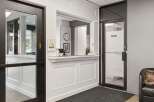 Welcome guests into a professional and inviting space with this well-appointed reception area.