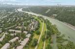 Experience serene living in this picturesque community nestled alongside a tranquil river.