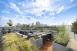 Experience luxury urban living with this stunning rooftop patio, offering breathtaking city skyline views.