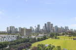 Experience breathtaking city views from this stunning property, offering a panoramic vista of the urban skyline.