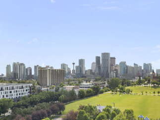Experience breathtaking city views from this stunning property, offering a panoramic vista of the urban skyline.