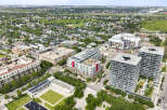 Discover modern urban living in this vibrant community featuring contemporary apartment buildings with sleek designs and abundant amenities.