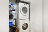Maximize your laundry space with this efficient stacked washer and dryer unit, perfect for apartments or smaller homes.
