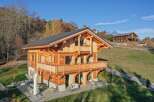 Experience luxury mountain living in this stunning timber-frame chalet, nestled on a picturesque hillside with breathtaking views.
