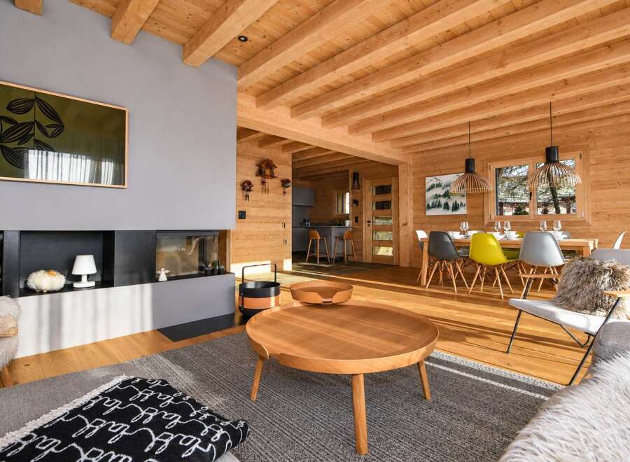 Experience rustic charm and modern comfort in this stunning log cabin living space.