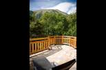 Enjoy breathtaking mountain views from this stunning outdoor patio, perfect for relaxation and entertaining.