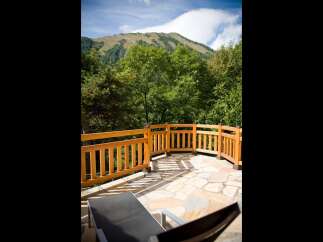 Enjoy breathtaking mountain views from this stunning outdoor patio, perfect for relaxation and entertaining.