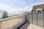 Enjoy breathtaking lake and mountain views from this stunning rooftop terrace.