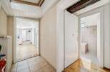 Step into this inviting hallway featuring a bright and airy atmosphere, perfect for a welcoming entrance.