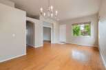 Step into this inviting living space featuring gleaming hardwood floors that extend throughout the home.