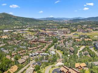 Discover this stunning mountain property offering breathtaking panoramic views of the surrounding peaks and valley.