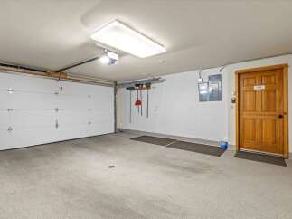 This spacious garage offers ample parking and storage solutions.