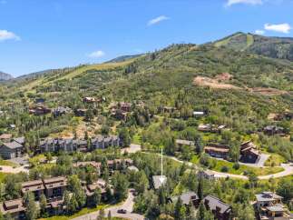 Nestled amidst the scenic beauty of a mountain landscape, this property offers a unique blend of luxury living and natural splendor.