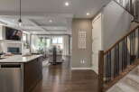 Experience modern living in this stunning open-concept home, featuring a gourmet kitchen island perfect for entertaining.