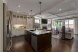 Experience luxury living in this stunning open-concept kitchen and living area.
