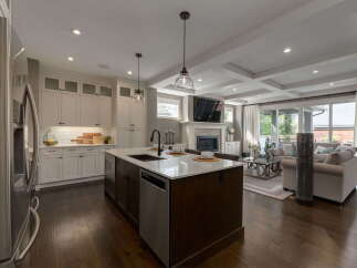 Experience luxury living in this stunning open-concept kitchen and living area.