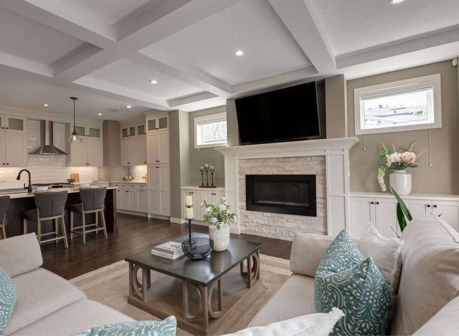Experience modern living in this open-concept home, featuring a gourmet kitchen with a spacious island and sleek cabinetry.