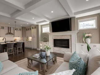 Experience modern living in this open-concept home, featuring a gourmet kitchen with a spacious island and sleek cabinetry.