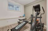Transform your home into a personal fitness sanctuary with this dedicated gym space.