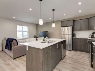 Experience modern living in this open-concept kitchen and living area.