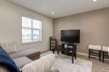 Step into this inviting living room, featuring a comfortable sectional sofa perfect for relaxation and entertainment.