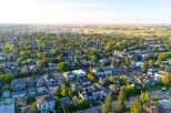 Discover this charming suburban neighborhood, featuring a variety of well-maintained homes nestled among mature trees.
