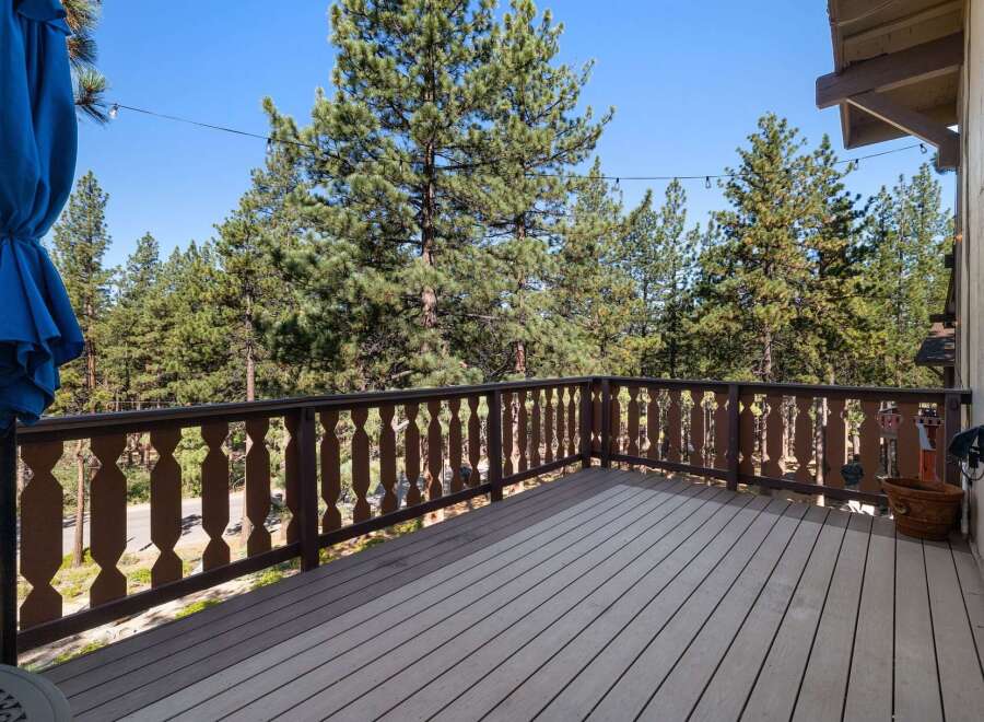 Enjoy the stunning mountain views from this spacious deck, perfect for outdoor entertaining or simply relaxing in nature.