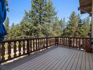 Enjoy the stunning mountain views from this spacious deck, perfect for outdoor entertaining or simply relaxing in nature.