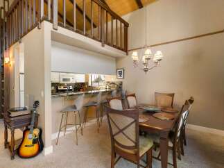 Experience the charm of this unique home featuring a lofted bedroom overlooking a spacious living area.