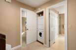 Discover convenient in-unit laundry facilities with a stacked washer and dryer, perfect for modern living.